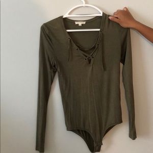 green lace up body suit